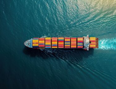 Aerial top view of cargo maritime ship container shipping carrying.